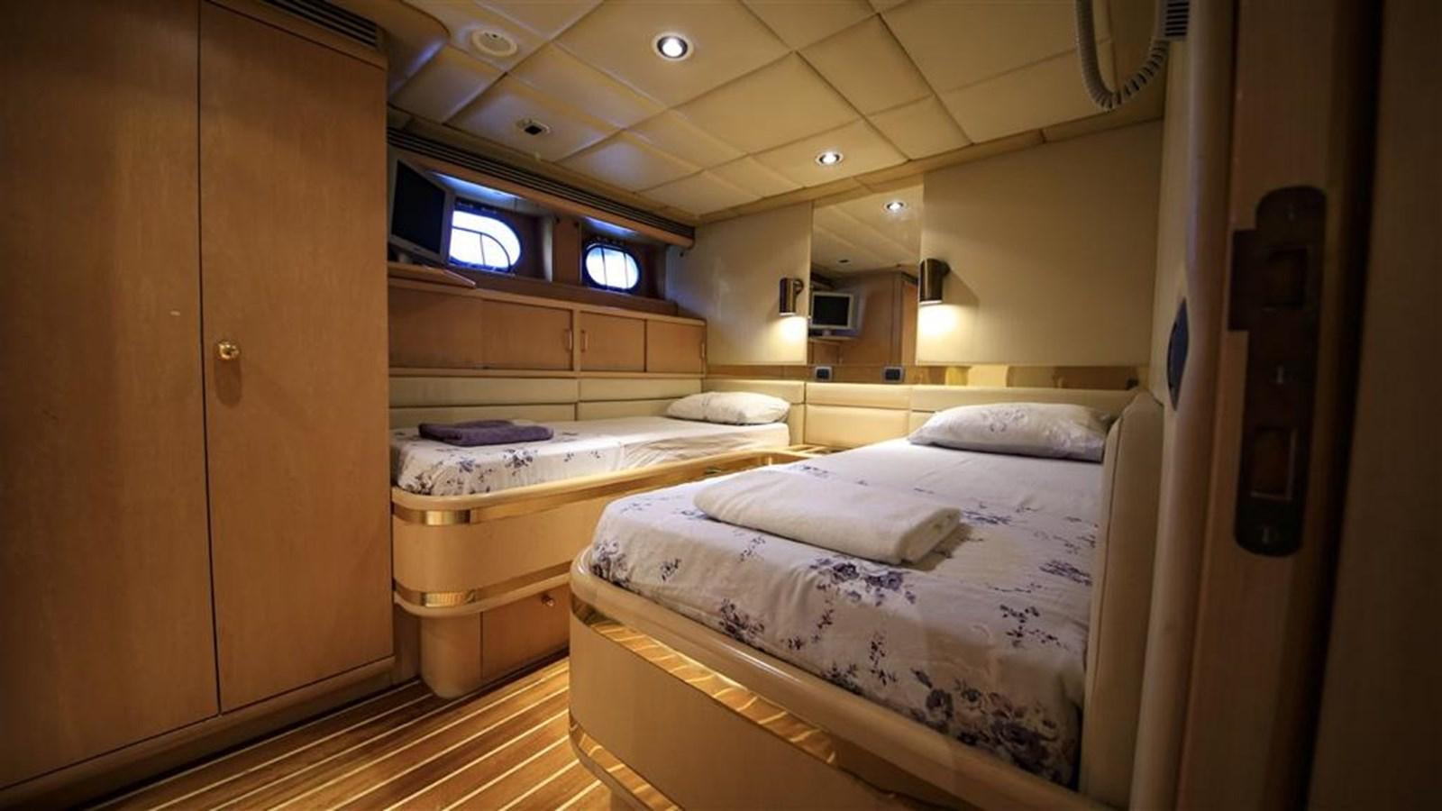 a room with bunk beds aboard AGARTHA Yacht for Sale