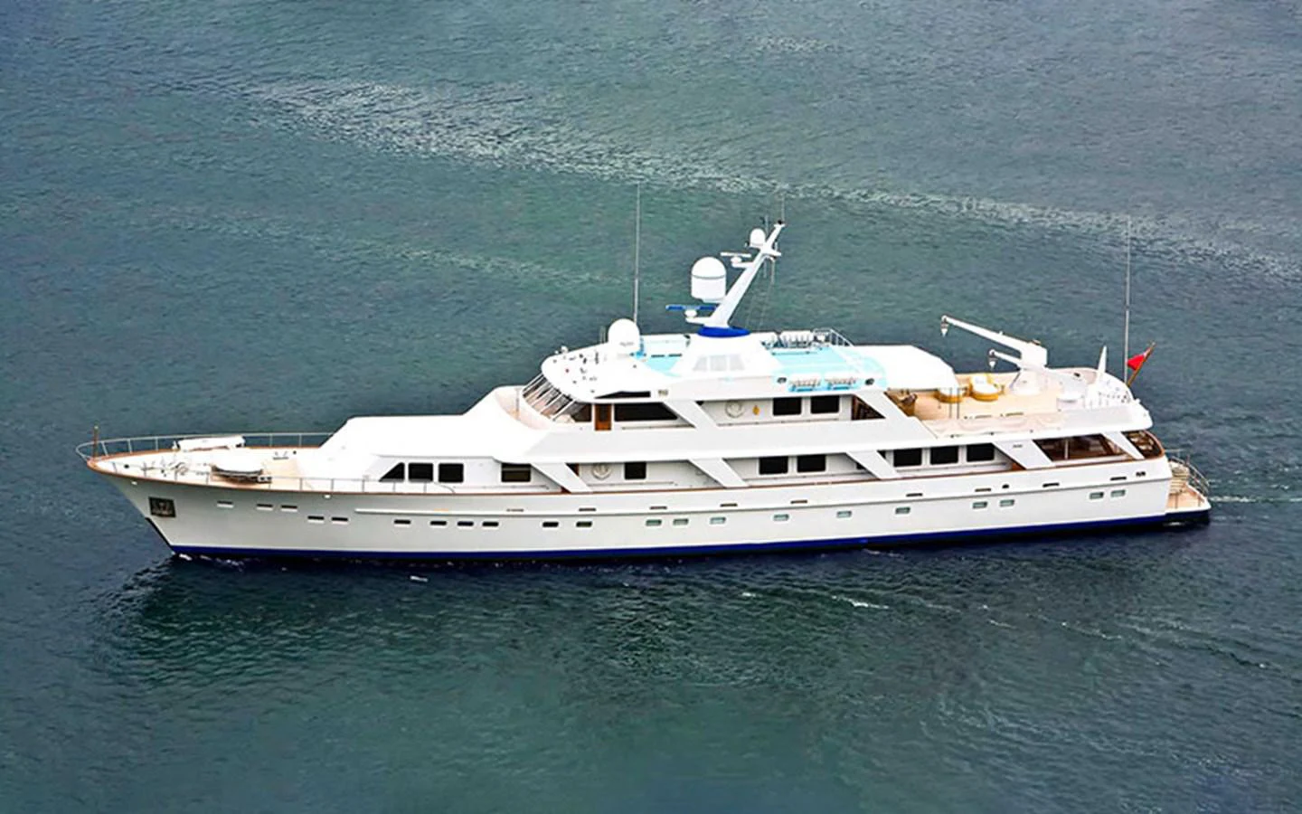 a white yacht in the water aboard NOSTALGIA Yacht for Sale