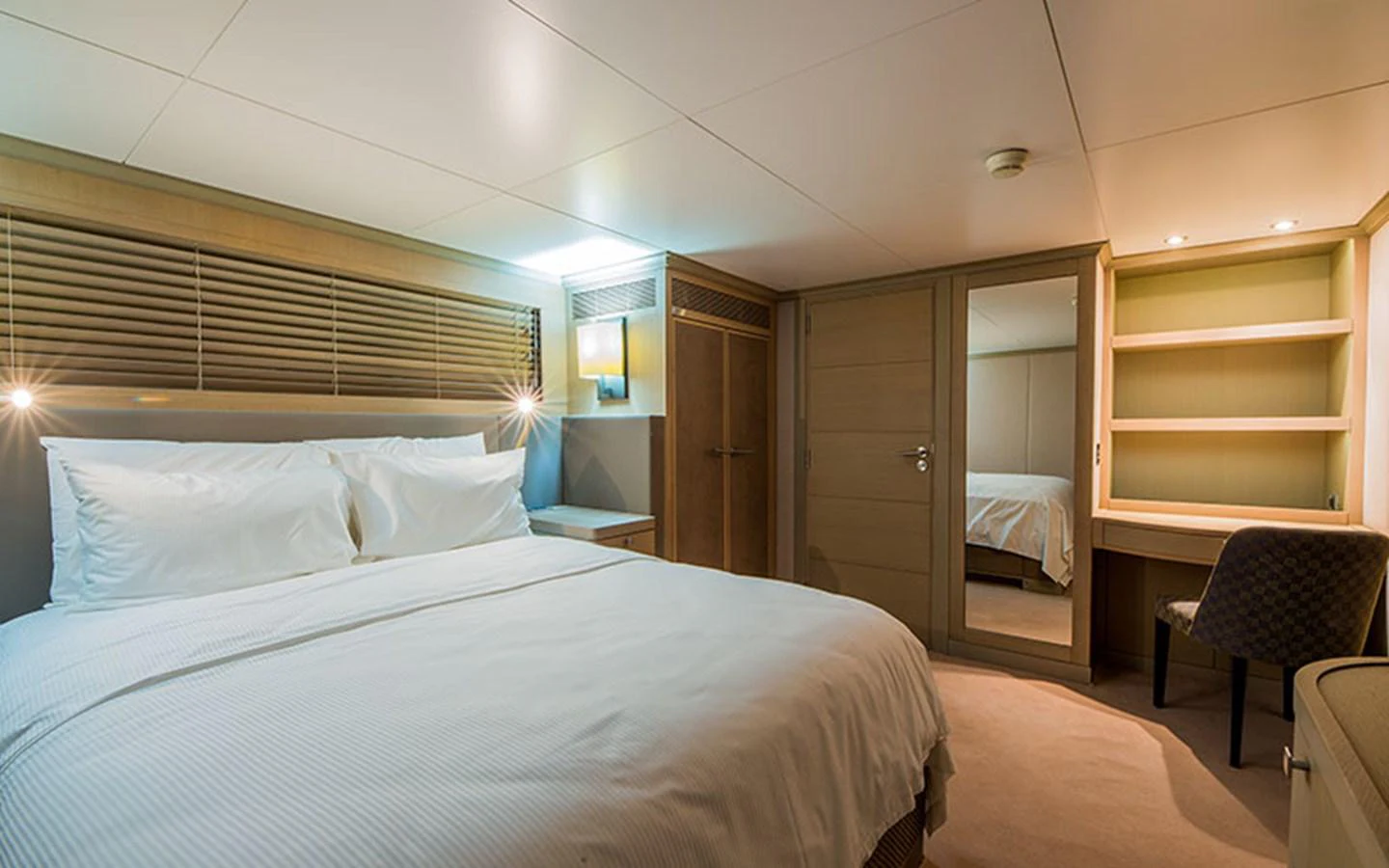 a bed in a room aboard NOSTALGIA Yacht for Sale