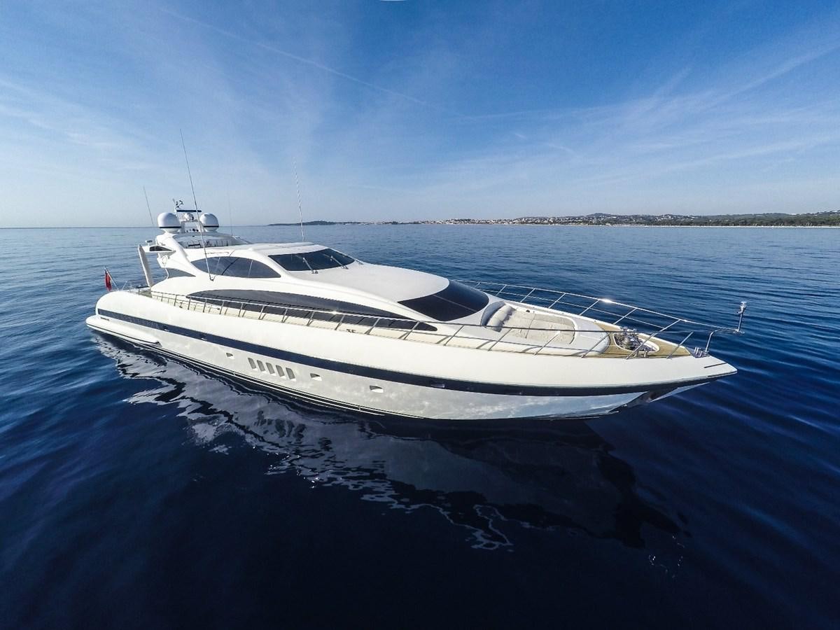 a white boat on a body of water aboard PHANTOM Yacht for Sale