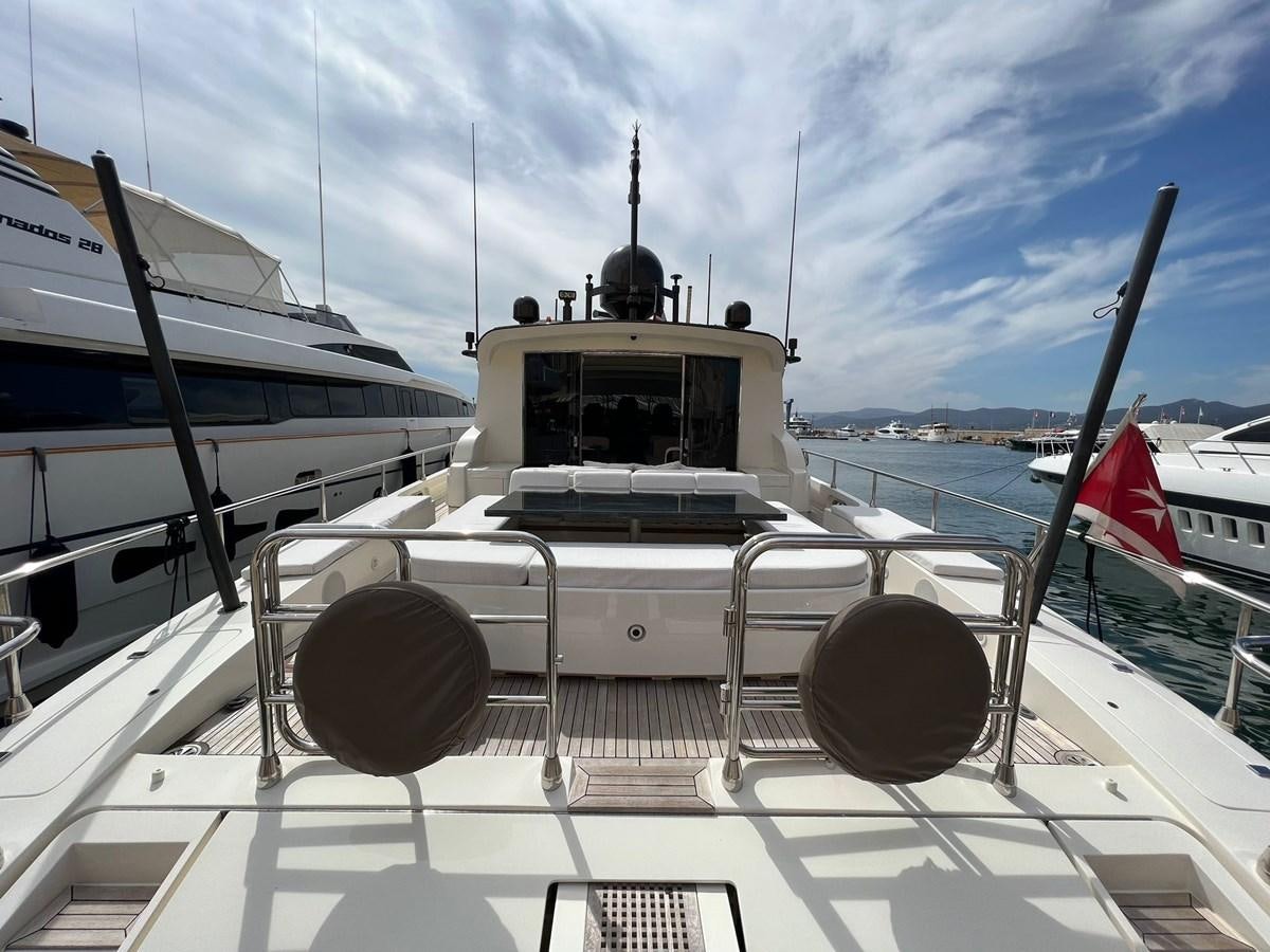 a boat with a flag on the front aboard SAGA ONE Yacht for Sale