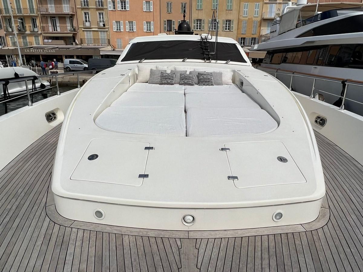 a white car with a hood aboard SAGA ONE Yacht for Sale