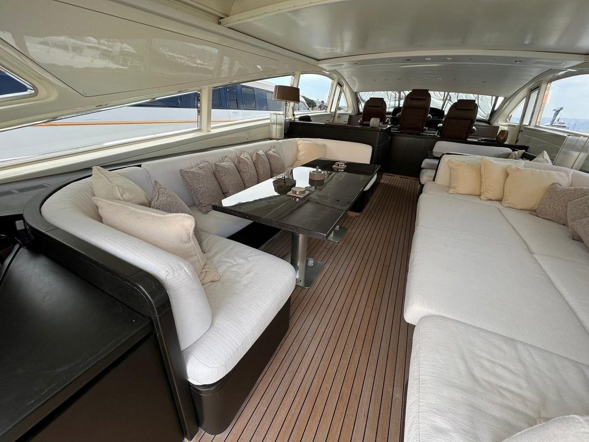 a train with a table and chairs aboard SAGA ONE Yacht for Sale
