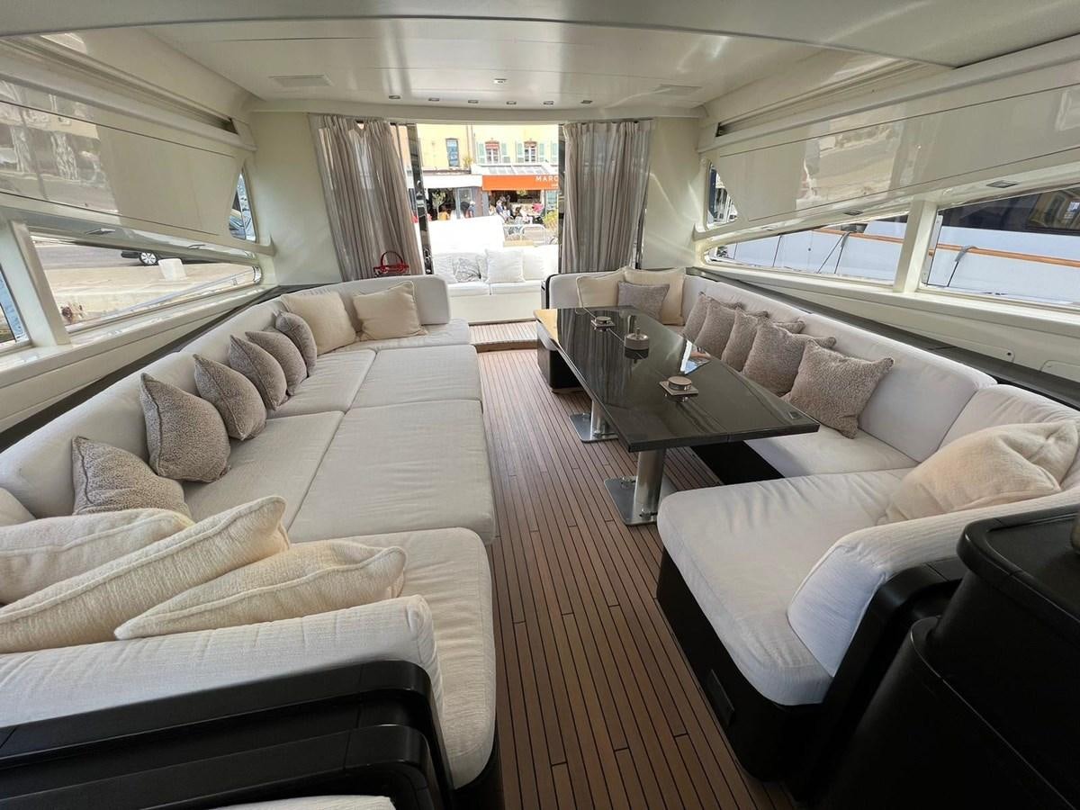 a living room with a couch and a table aboard SAGA ONE Yacht for Sale