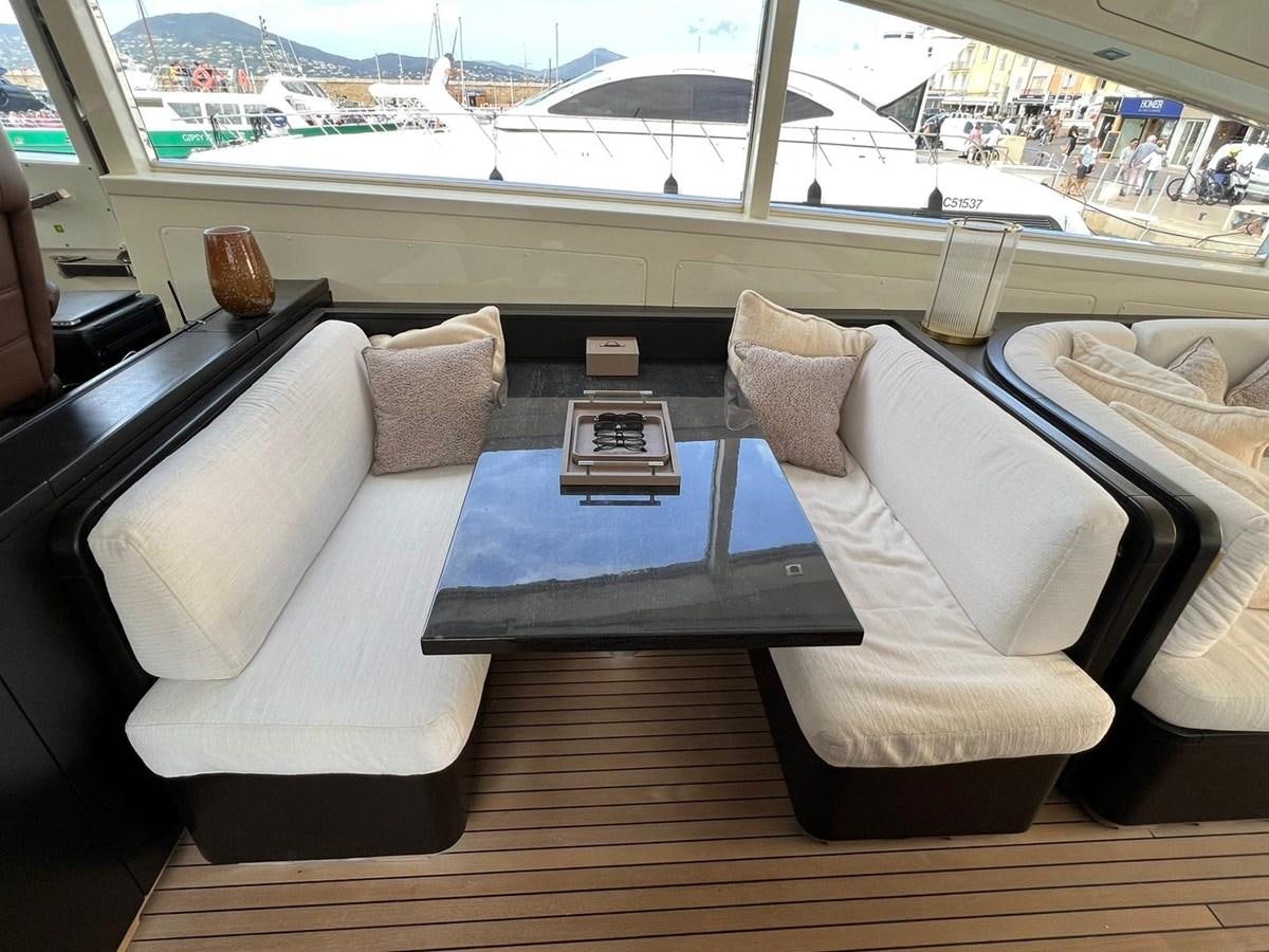 a table with pillows on it aboard SAGA ONE Yacht for Sale