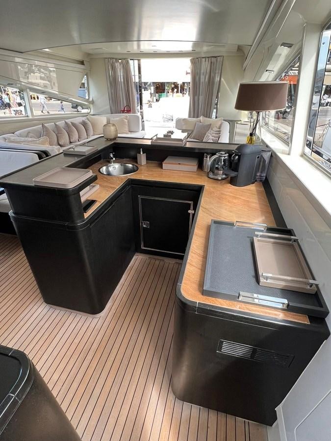 a living room with a couch and a tv aboard SAGA ONE Yacht for Sale