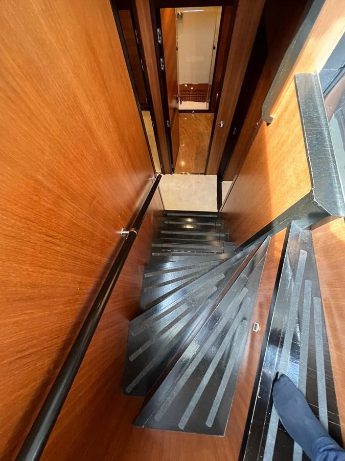 a set of stairs in a room aboard SAGA ONE Yacht for Sale