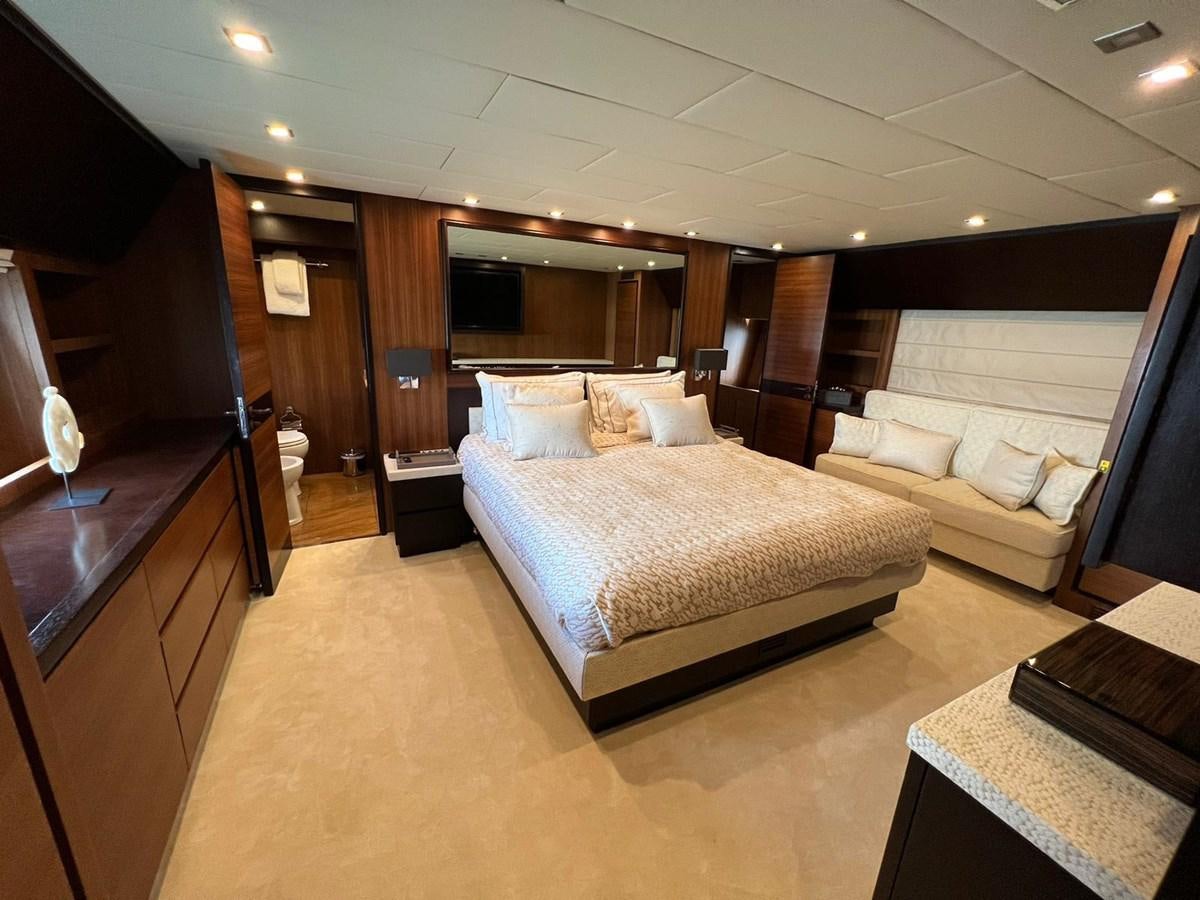 a large bedroom with a bed aboard SAGA ONE Yacht for Sale