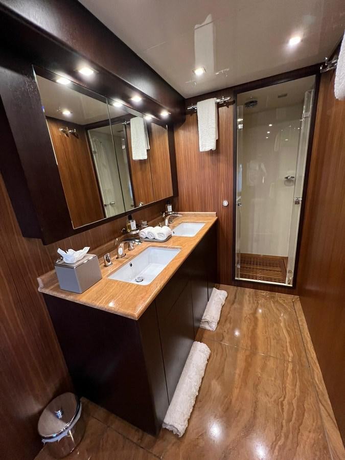 a bathroom with a sink and a mirror aboard SAGA ONE Yacht for Sale