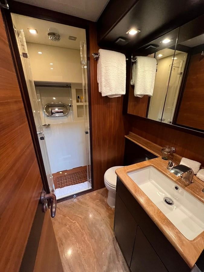 a bathroom with a sink and a toilet aboard SAGA ONE Yacht for Sale