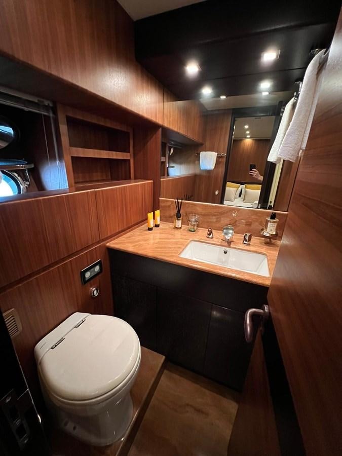 a bathroom with a sink and a toilet aboard SAGA ONE Yacht for Sale