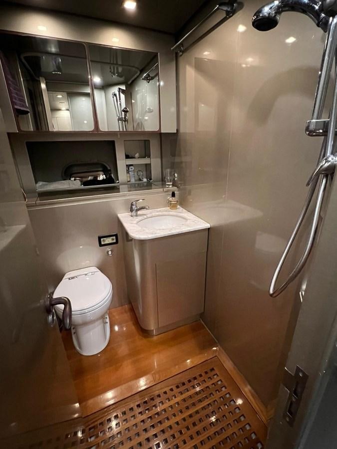 a bathroom with a toilet and sink aboard SAGA ONE Yacht for Sale