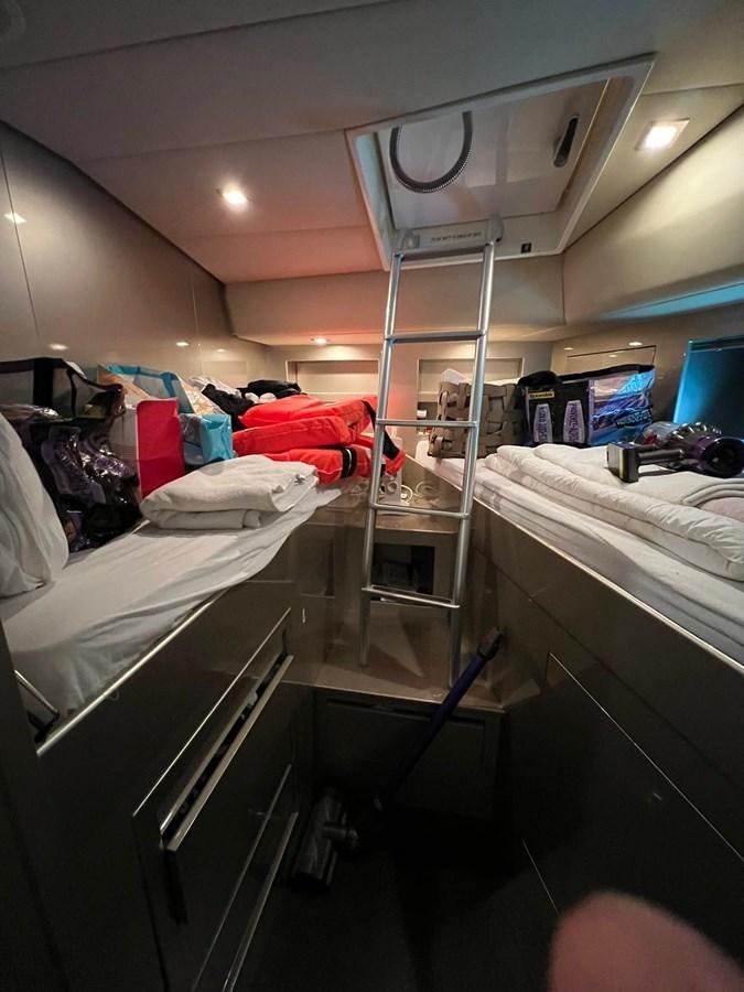 a room with bunk beds aboard SAGA ONE Yacht for Sale