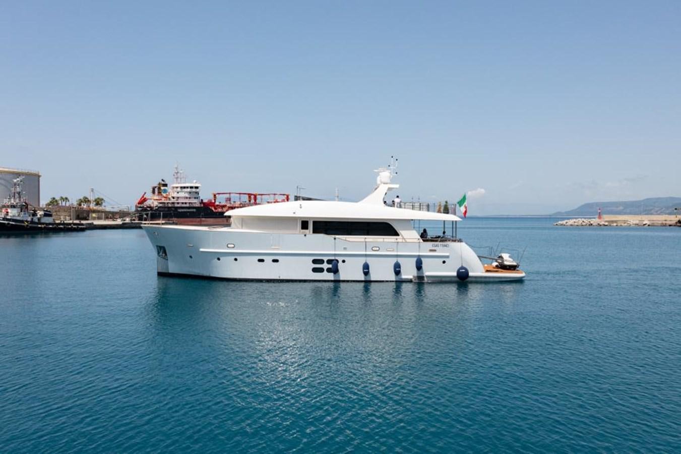 a large white boat in the water aboard MR GU Yacht for Sale