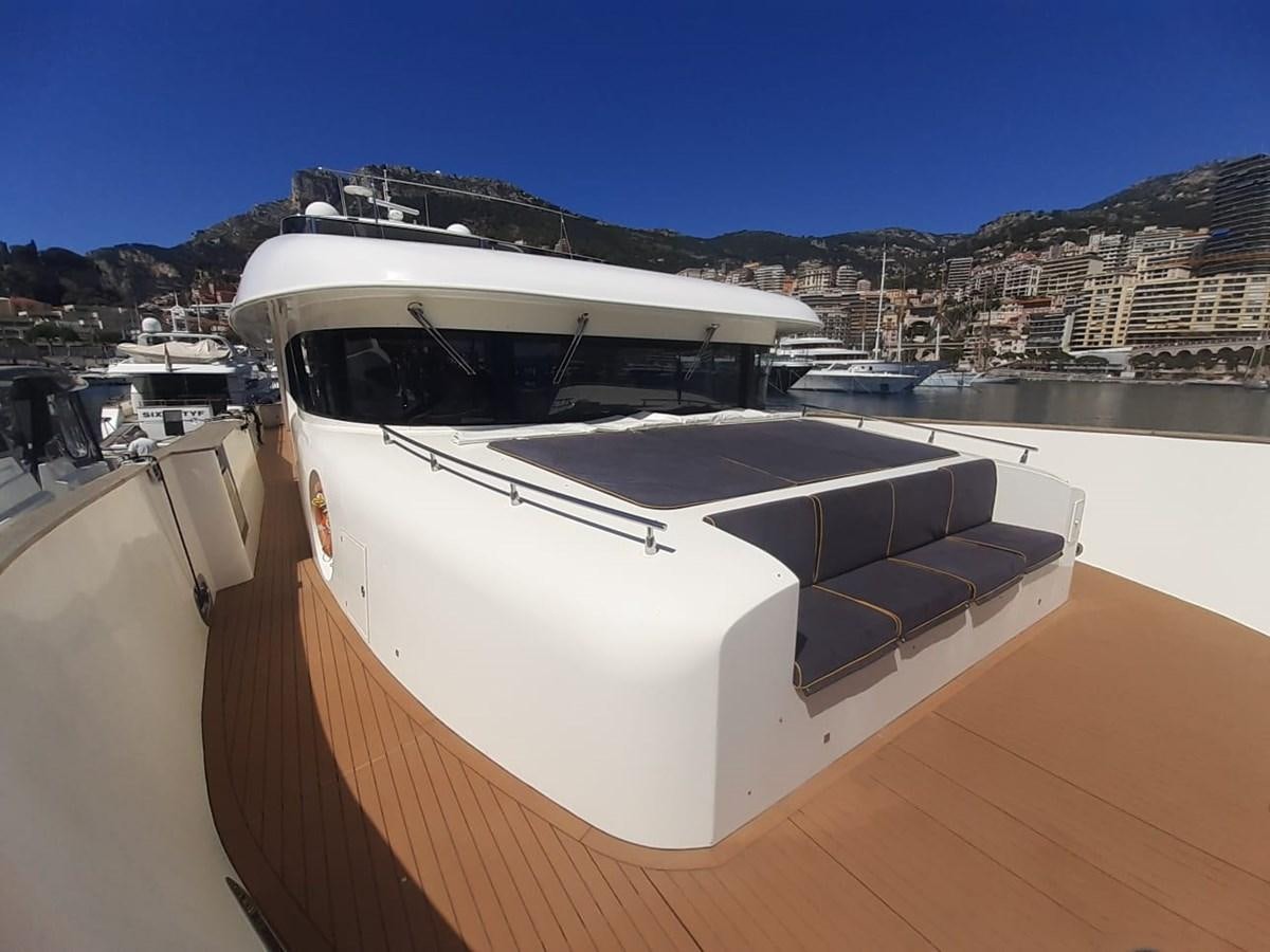 a boat on a dock aboard MR GU Yacht for Sale