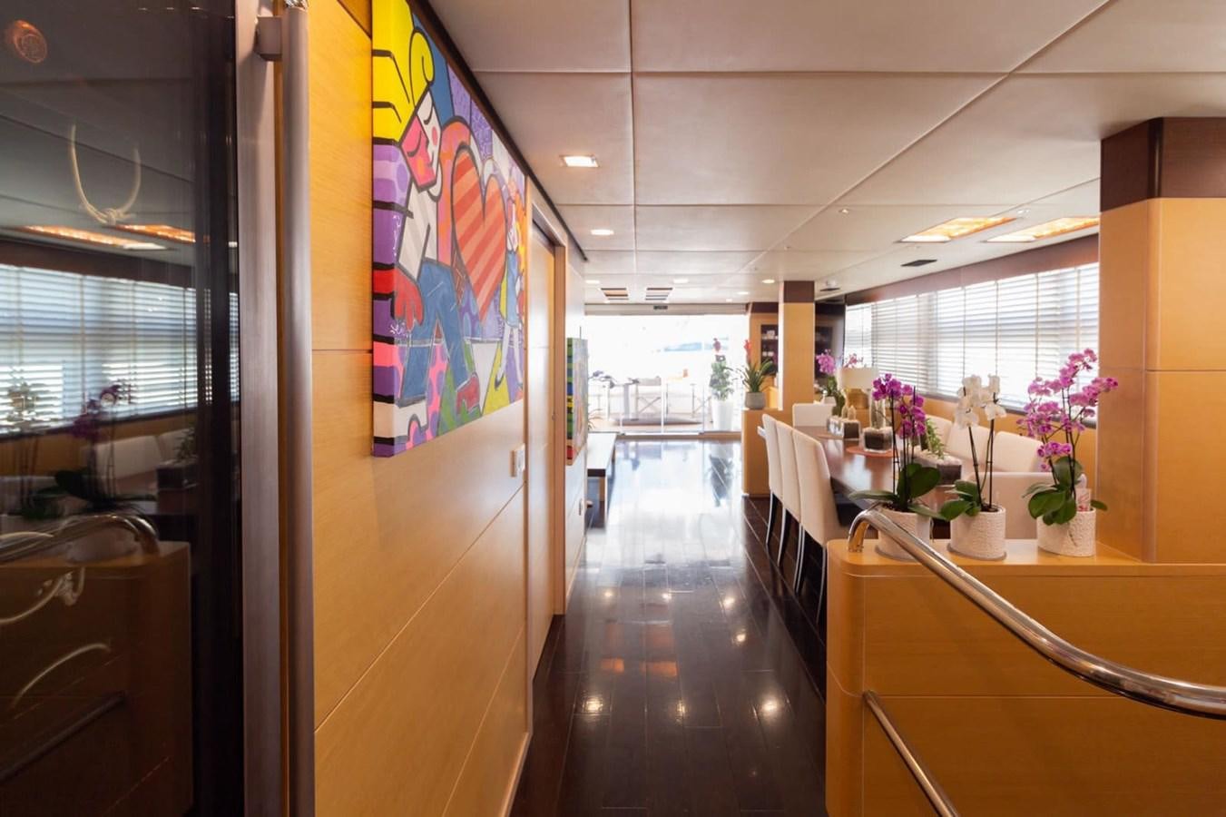 a hallway with a flowered wall aboard MR GU Yacht for Sale