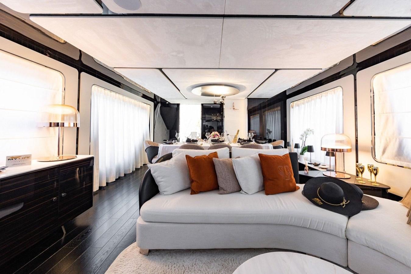 a large white bed in a room aboard POSILLIPO TECHNEMA 90 Yacht for Sale
