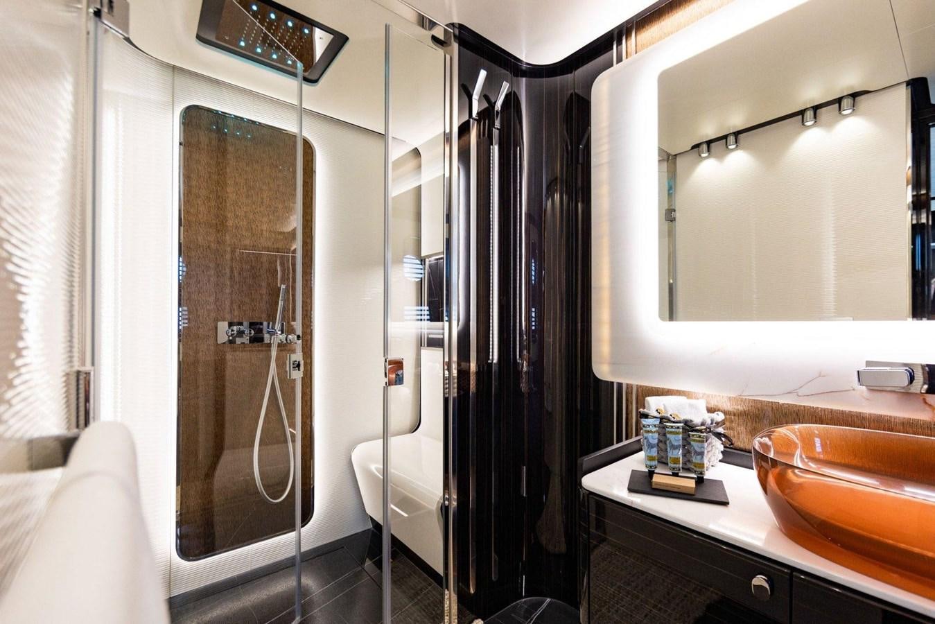 a bathroom with a shower and sink aboard POSILLIPO TECHNEMA 90 Yacht for Sale