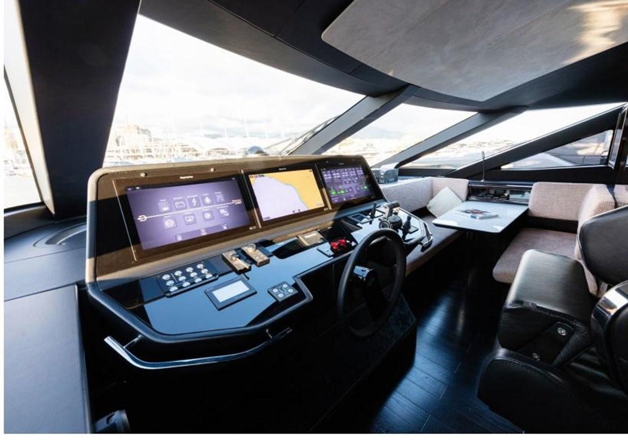a cockpit with a desk and computer aboard POSILLIPO TECHNEMA 90 Yacht for Sale