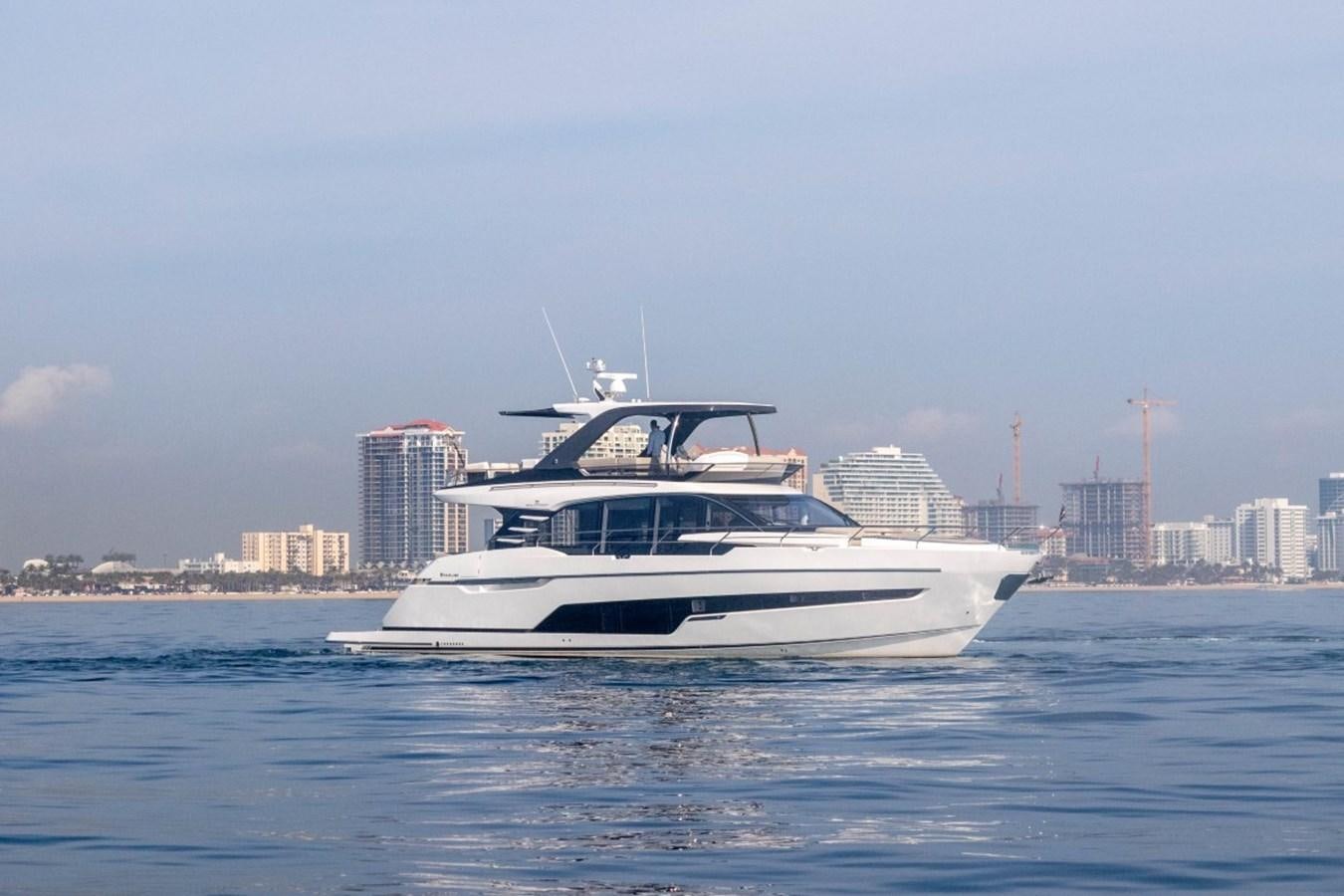 a white boat on the water aboard 2024 NEW SQUADRON 68 FAIRLINE Yacht for Sale