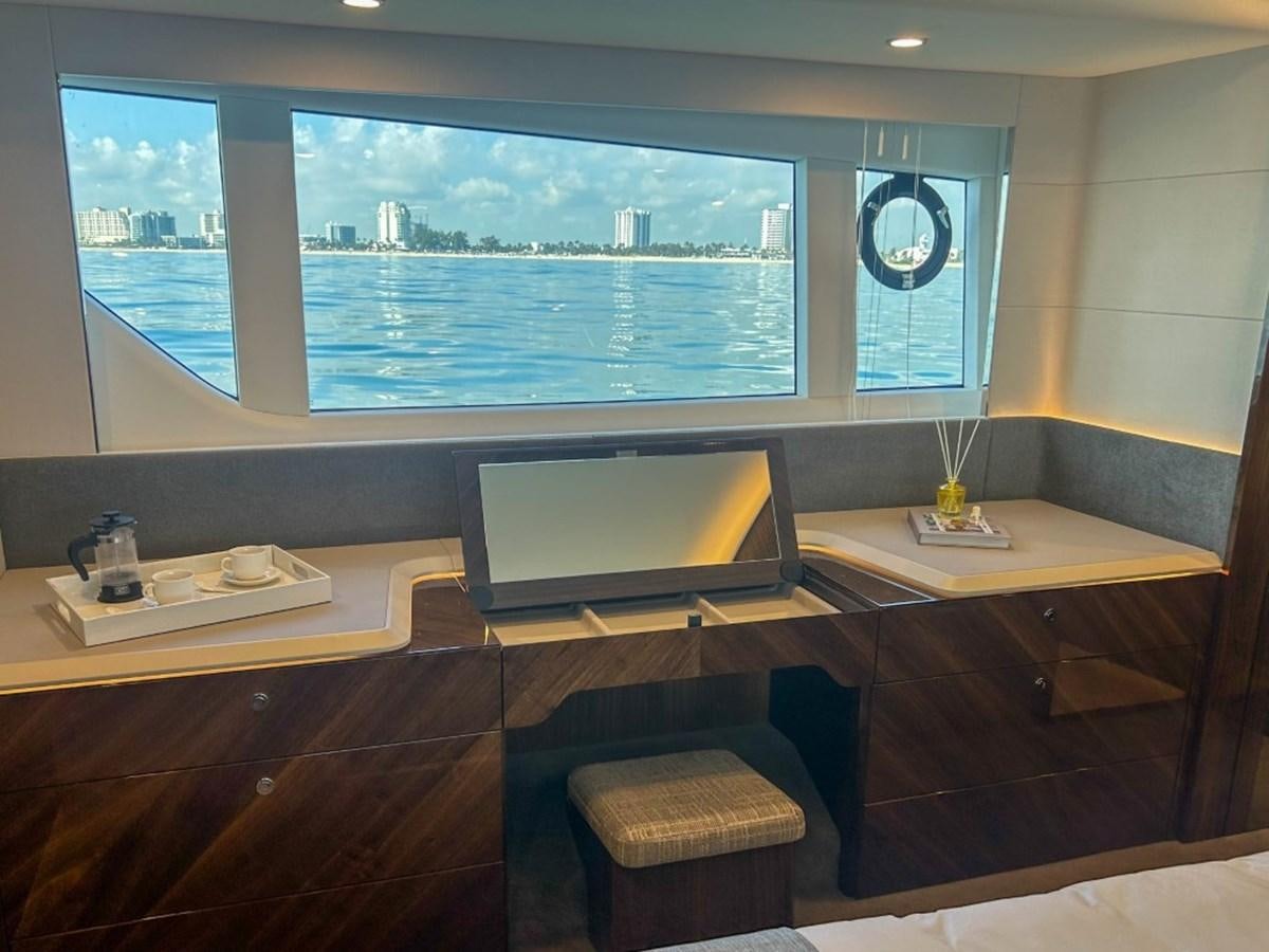a room with a large window aboard 2024 NEW SQUADRON 68 FAIRLINE Yacht for Sale