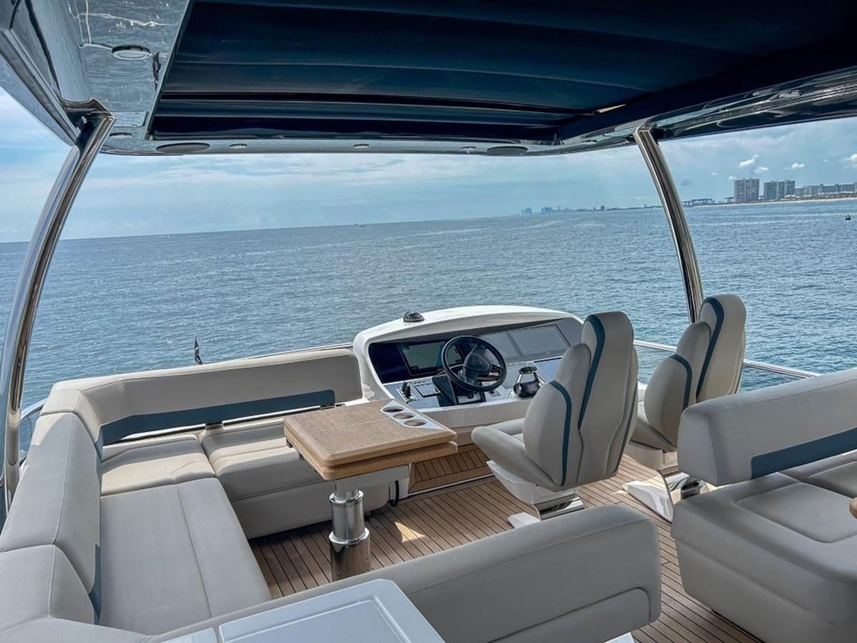 a boat with a view of the water and a city below aboard 2024 NEW SQUADRON 68 FAIRLINE Yacht for Sale