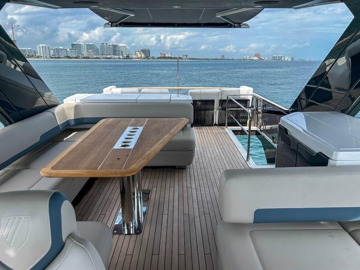 a deck with a view of a city and water aboard 2024 NEW SQUADRON 68 FAIRLINE Yacht for Sale