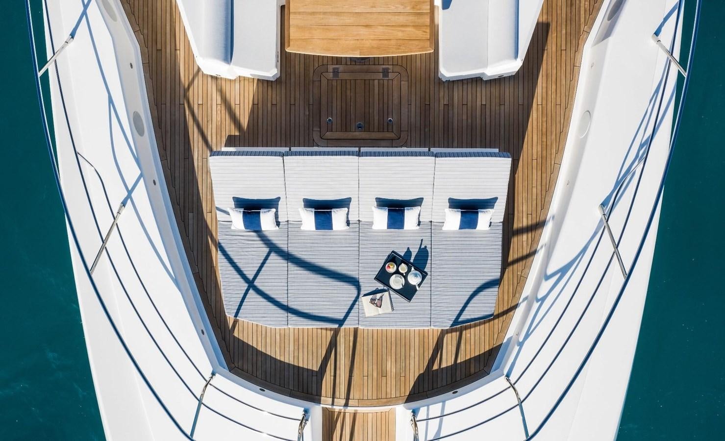 a group of chairs on a balcony aboard GEORGE P Yacht for Sale