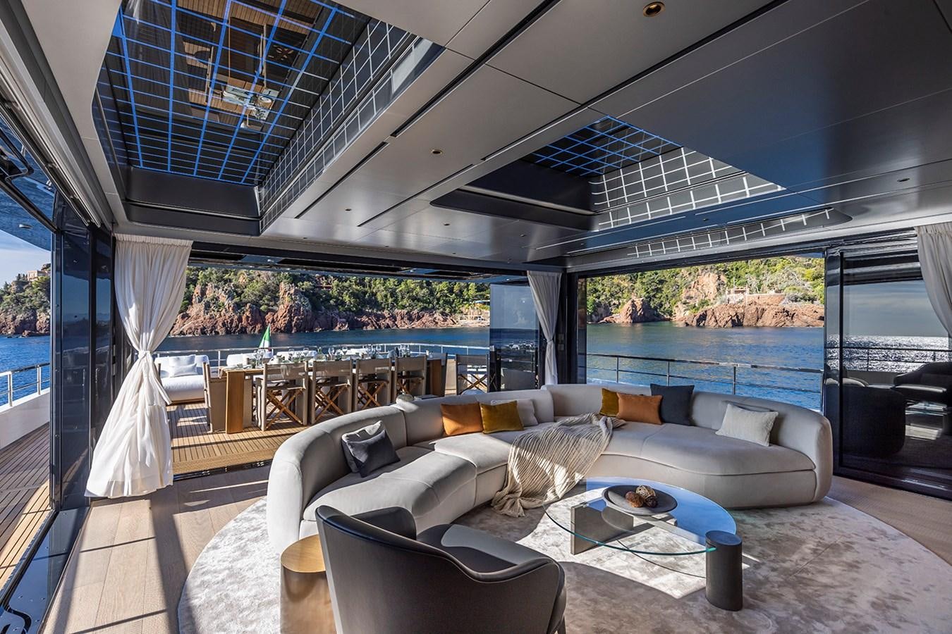 a living room with a large glass ceiling aboard ARCADIA 96 Yacht for Sale