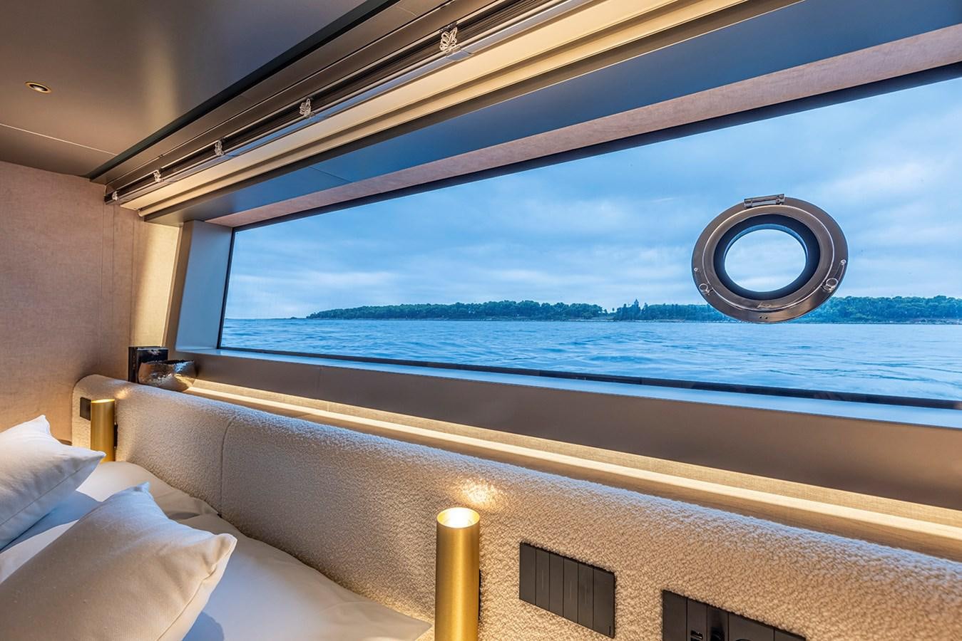 a large window with a view of the ocean and the ocean aboard ARCADIA 96 Yacht for Sale