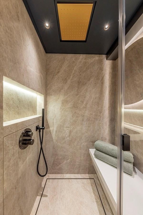 a bathroom with a shower and sink aboard ARCADIA 96 Yacht for Sale