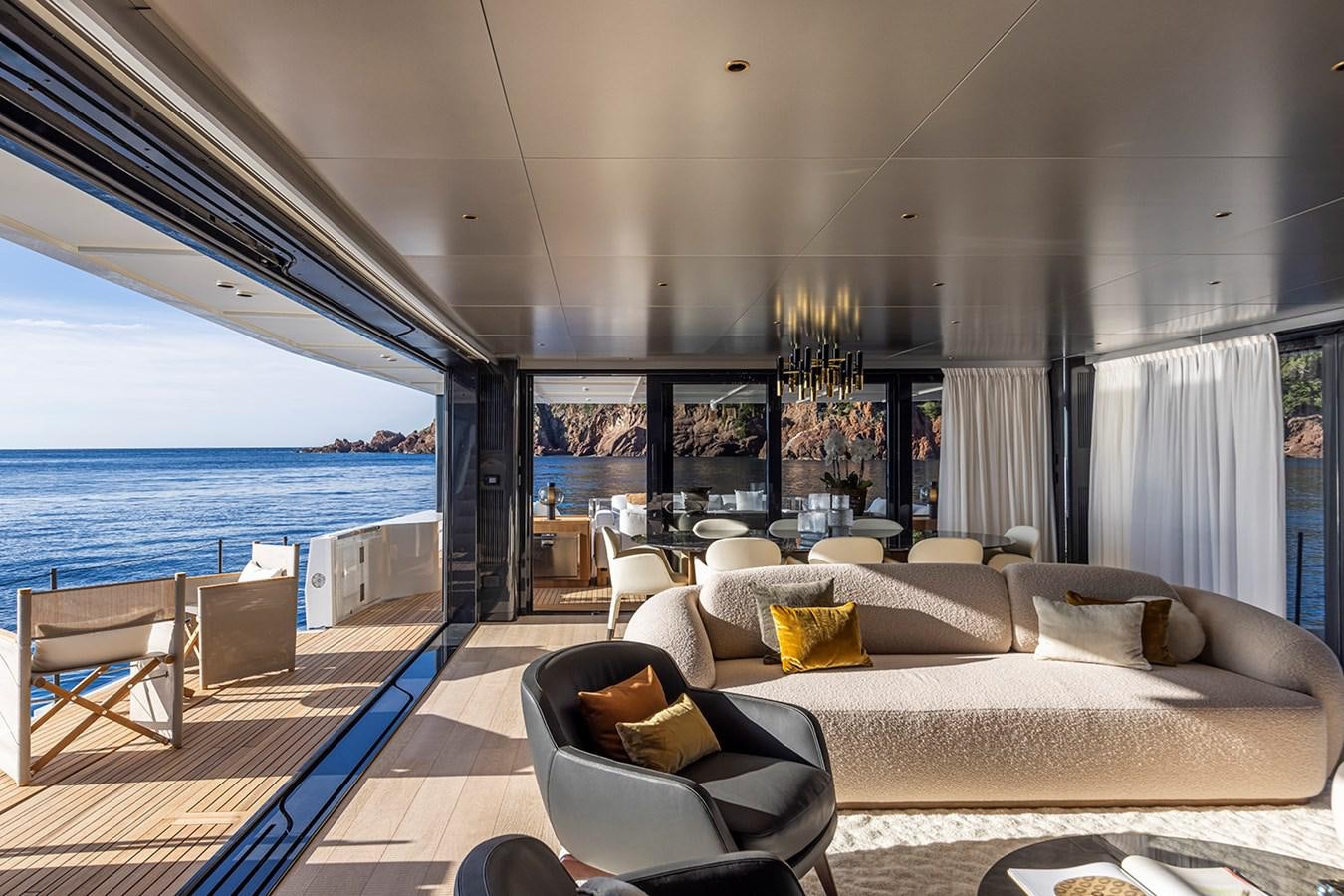 a large living room with a large balcony aboard ARCADIA 96 Yacht for Sale