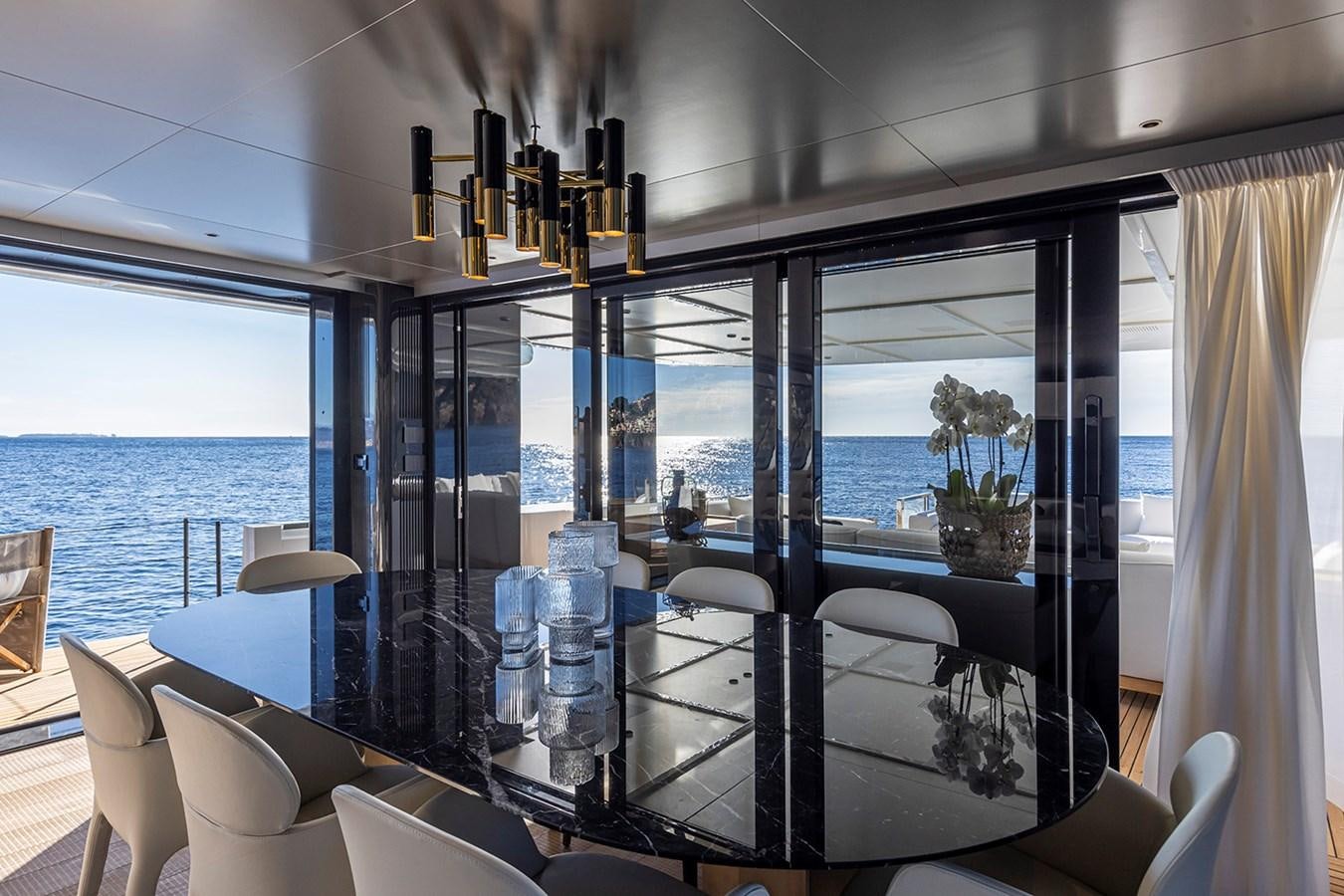 a room with a view of the ocean and the ocean aboard ARCADIA 96 Yacht for Sale
