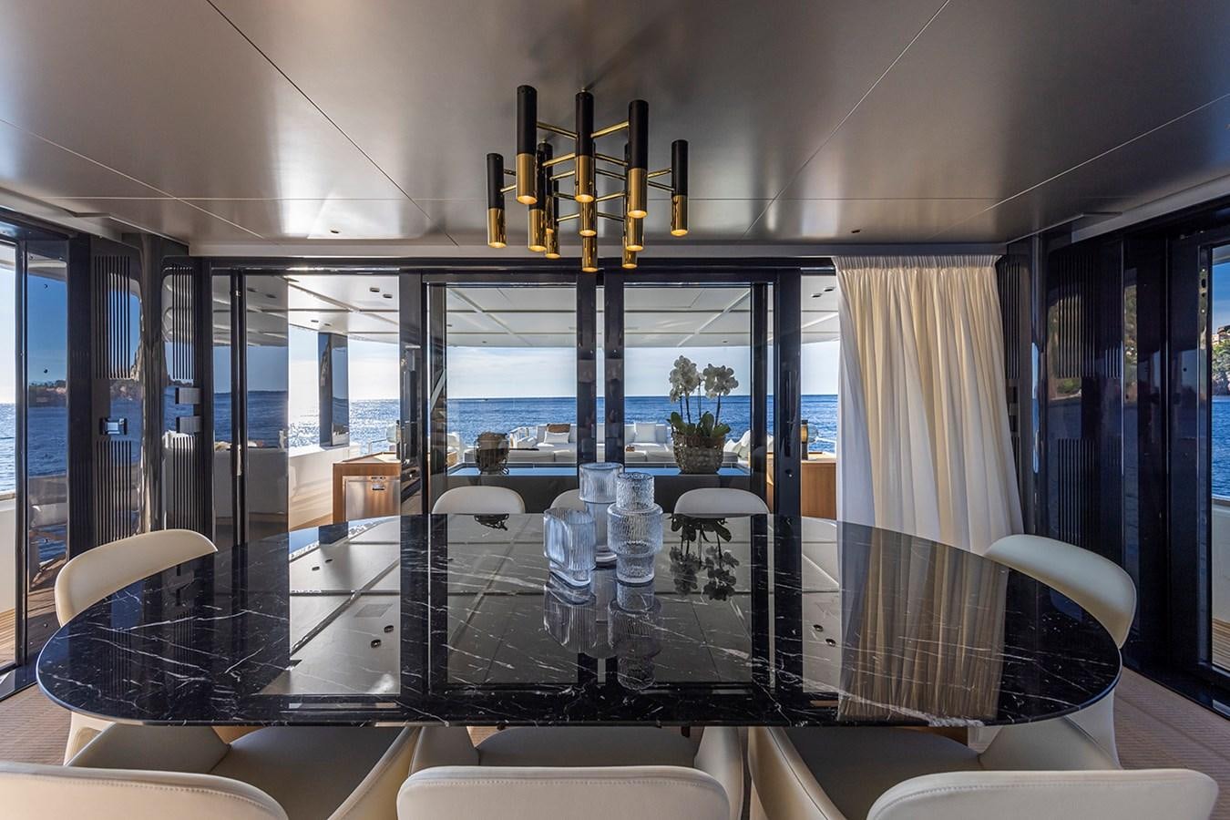 a large machine with a large yellow object on the top aboard ARCADIA 96 Yacht for Sale