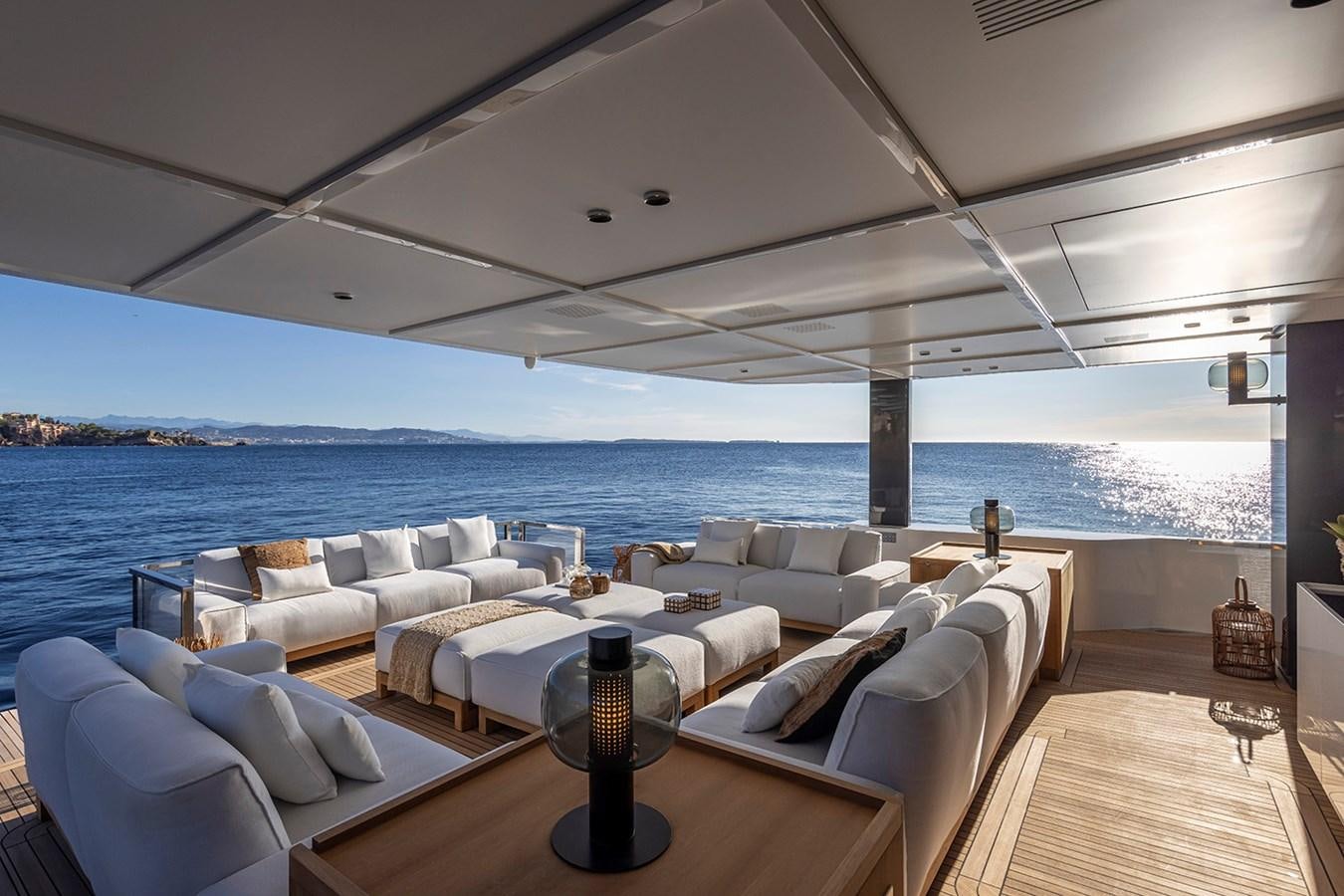 a living room with a large body of water aboard ARCADIA 96 Yacht for Sale