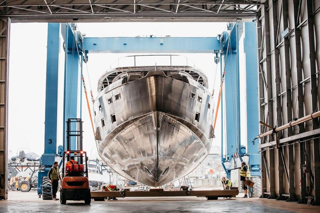 a large machine in a factory aboard 2024 ARKSEN 85 Yacht for Sale