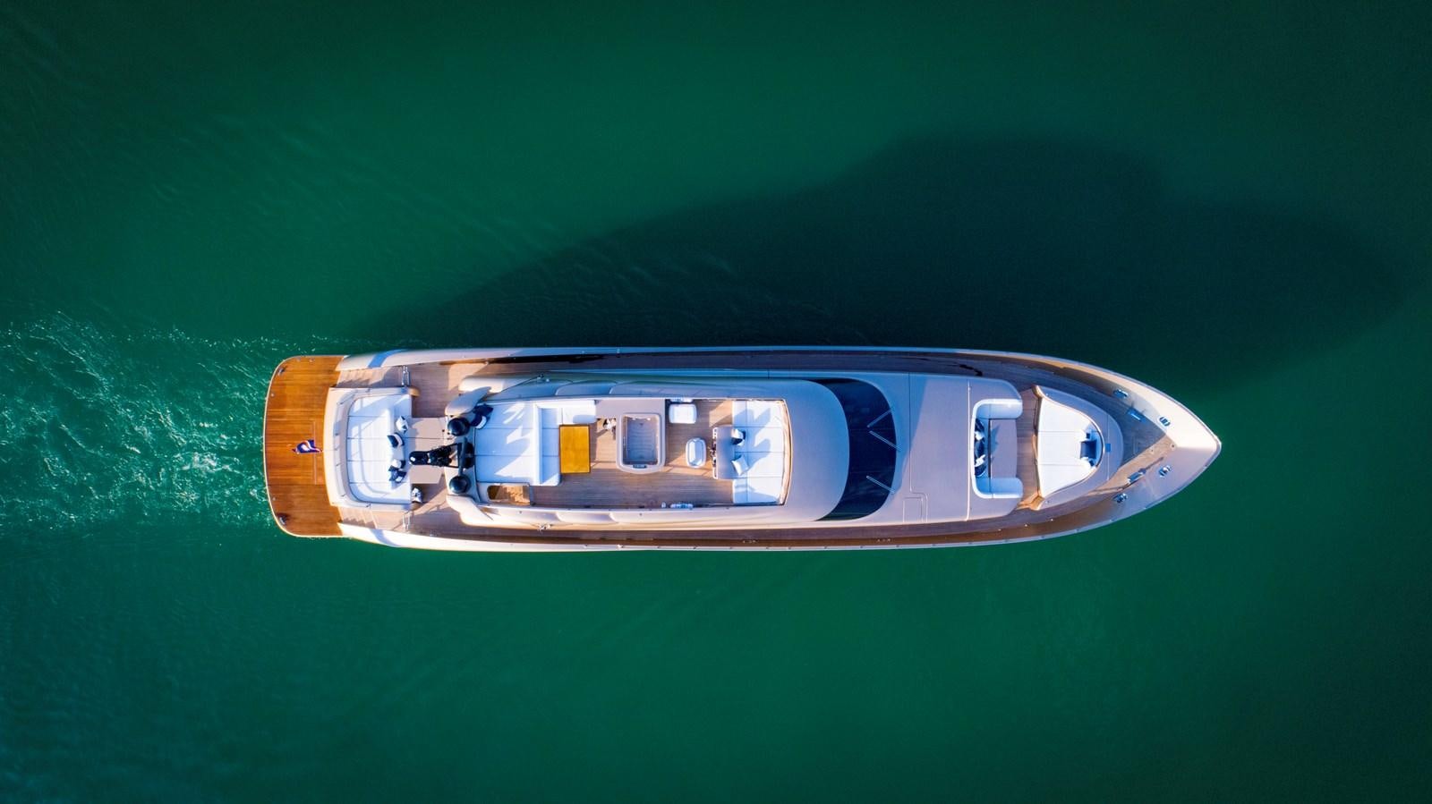 a white and orange boat on water aboard FIVE WAVES Yacht for Sale