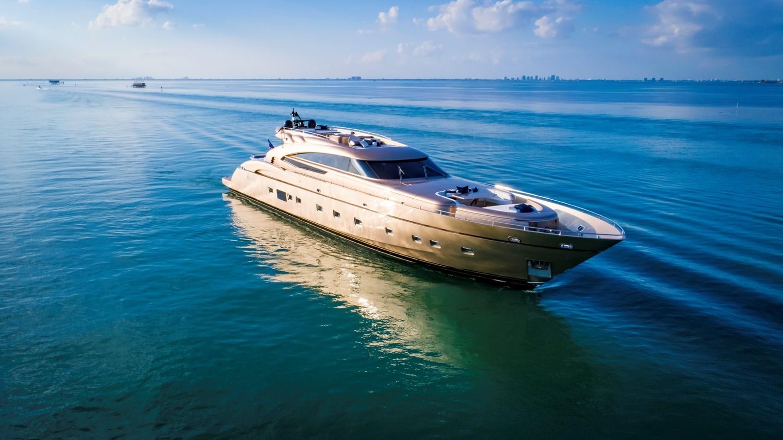 a white yacht in the water aboard FIVE WAVES Yacht for Sale
