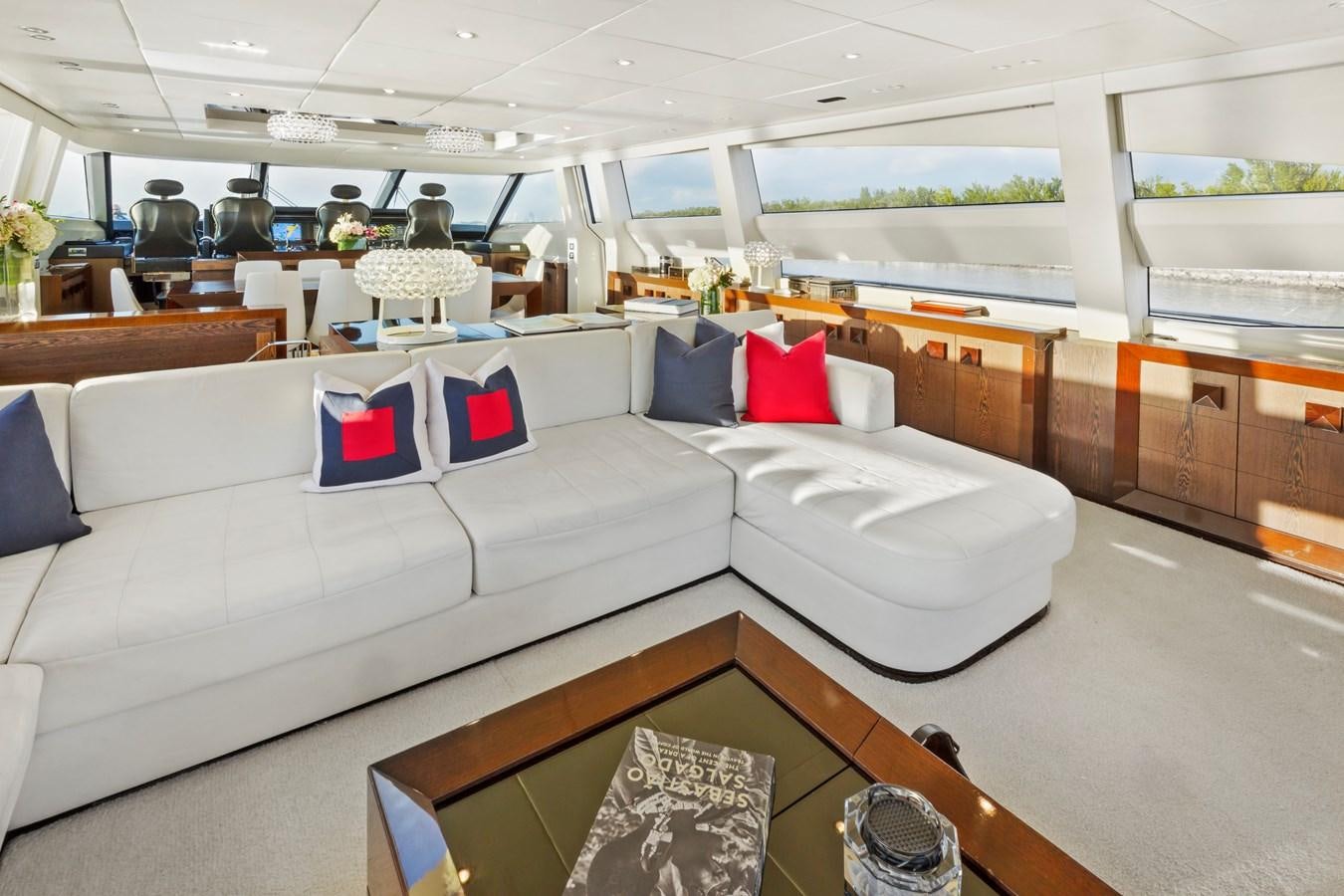 a room with couches and a table aboard FIVE WAVES Yacht for Sale