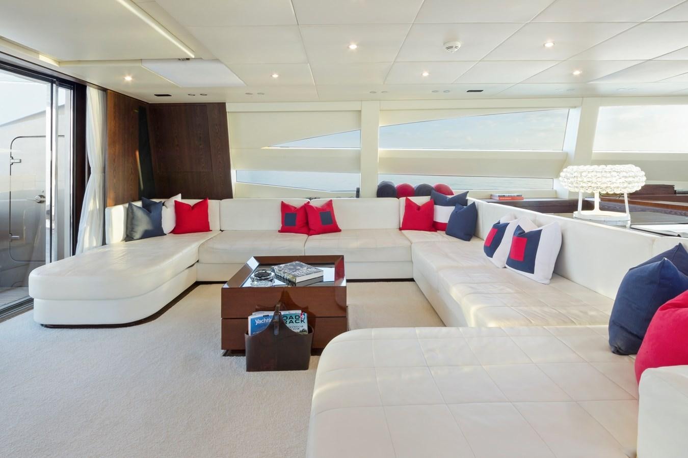 a room with a couch and a table aboard FIVE WAVES Yacht for Sale