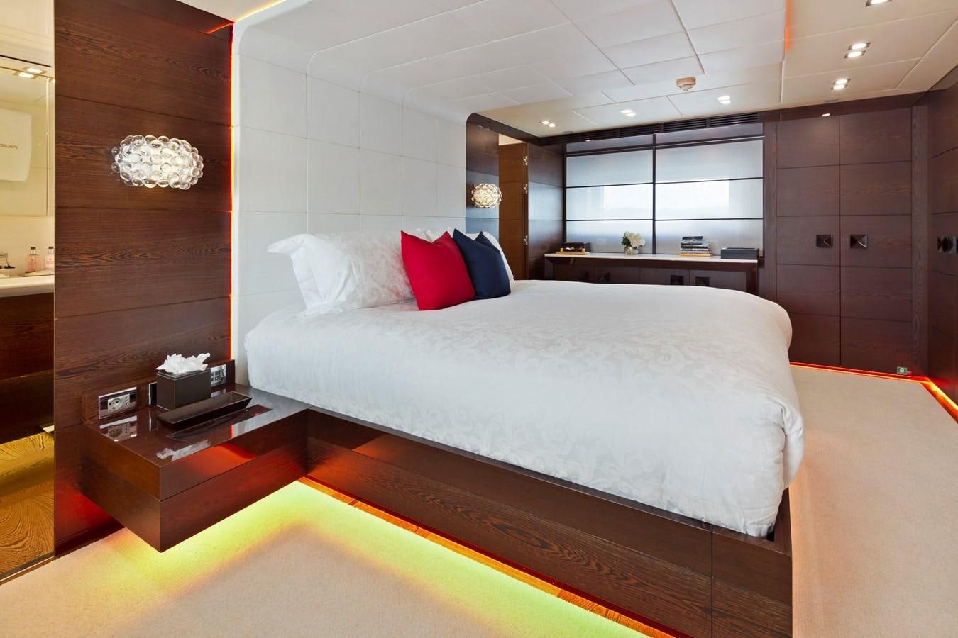 a bed in a room aboard FIVE WAVES Yacht for Sale