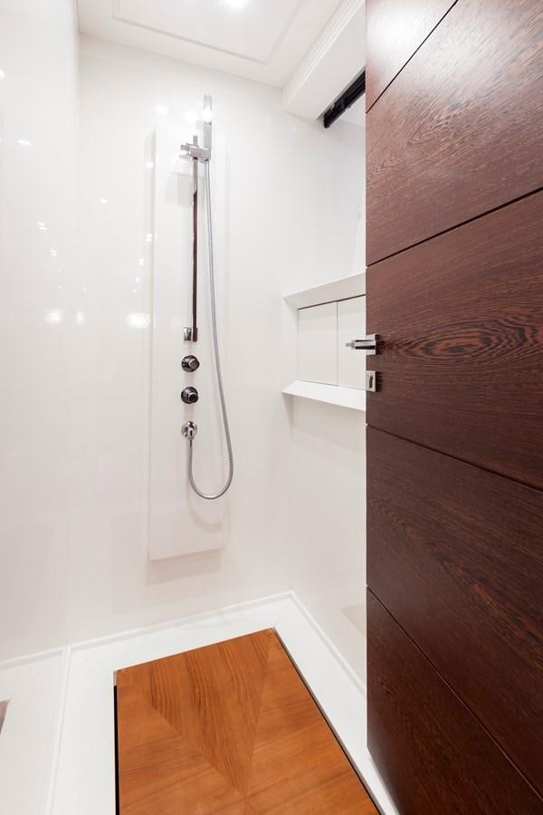 a white door with a handle aboard FIVE WAVES Yacht for Sale