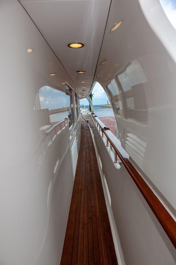 a long wooden staircase aboard SUNRISE Yacht for Sale