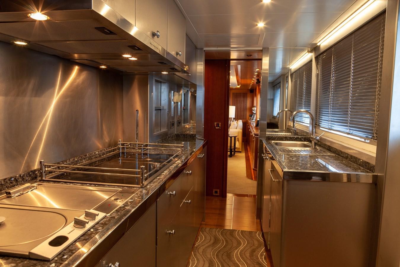 a kitchen with a large countertop aboard SUNRISE Yacht for Sale