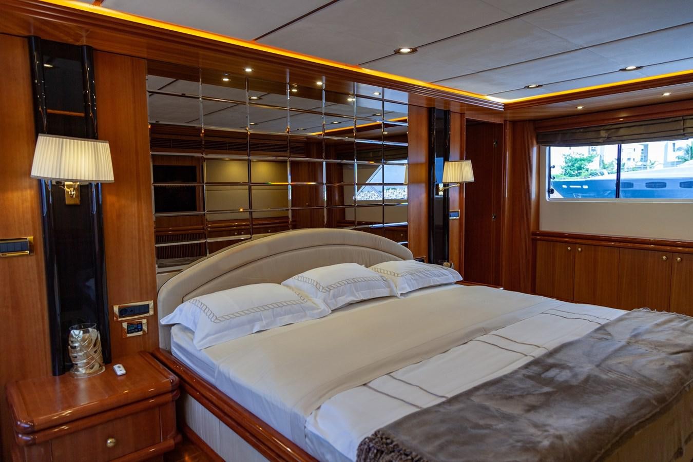 a couple of beds in a room aboard SUNRISE Yacht for Sale