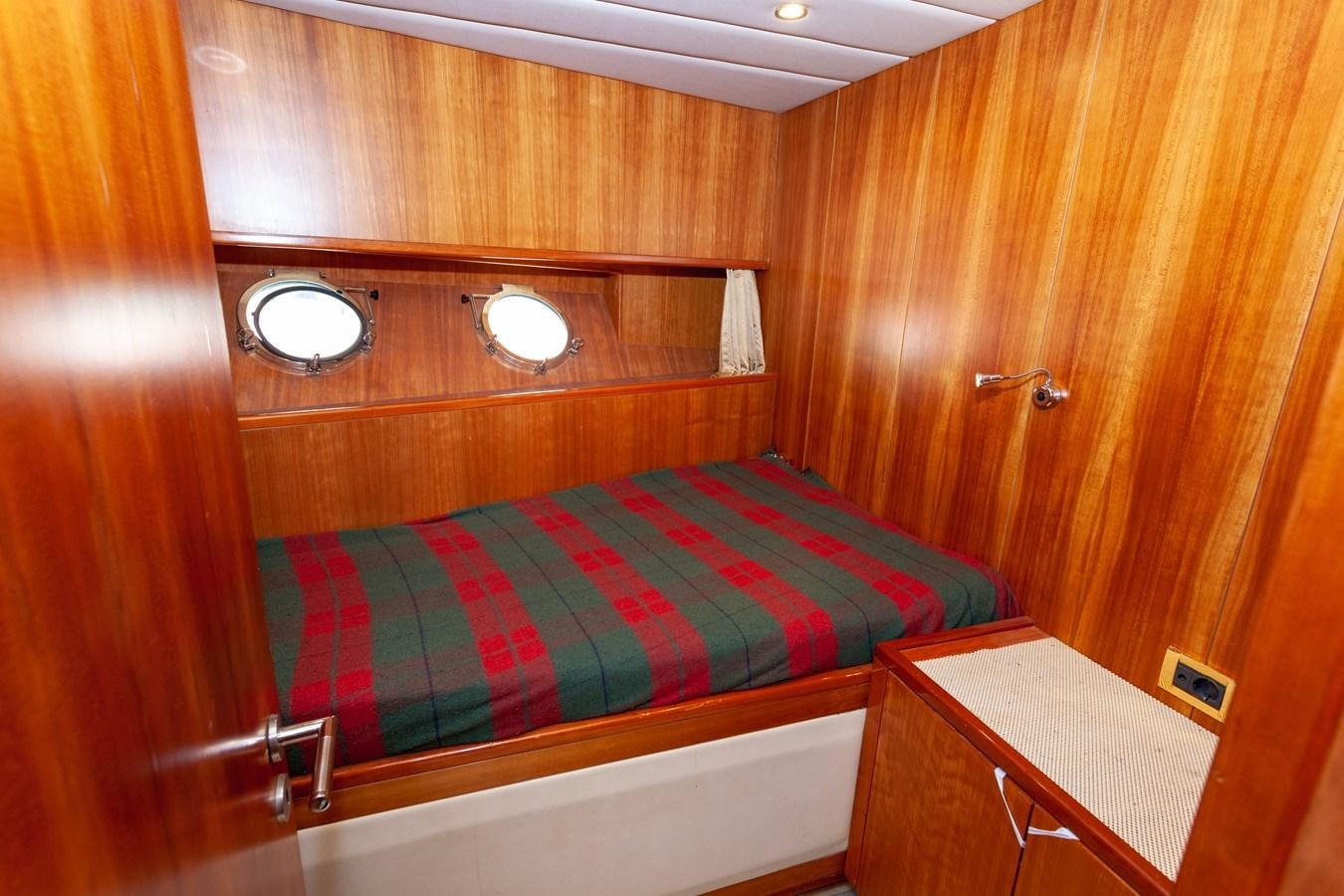 a bed in a room aboard SUNRISE Yacht for Sale