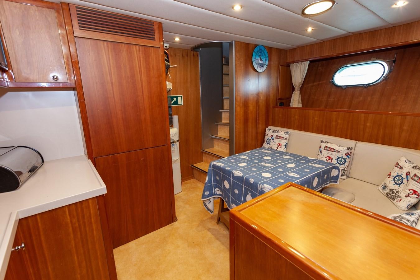 a room with a bed and a sink aboard SUNRISE Yacht for Sale