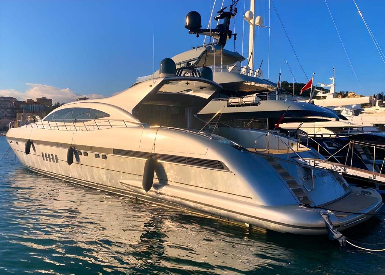 a boat docked at a pier aboard ESCAPE MANA Yacht for Sale