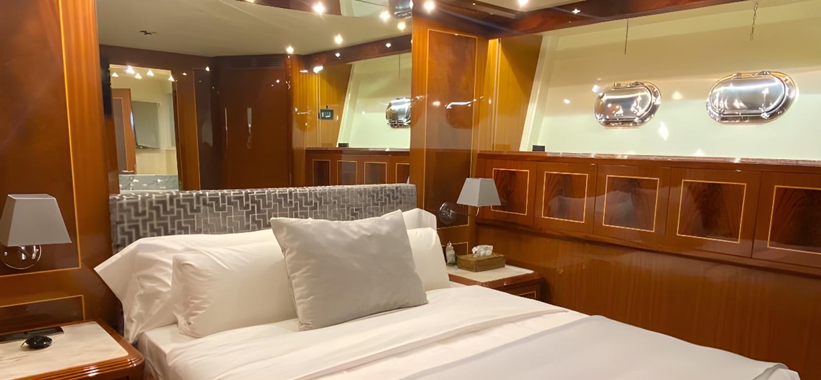 a hotel room with a bed aboard ESCAPE MANA Yacht for Sale