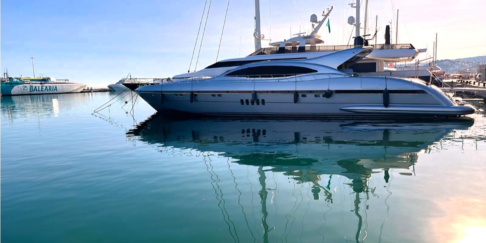 a white boat in the water aboard ESCAPE MANA Yacht for Sale